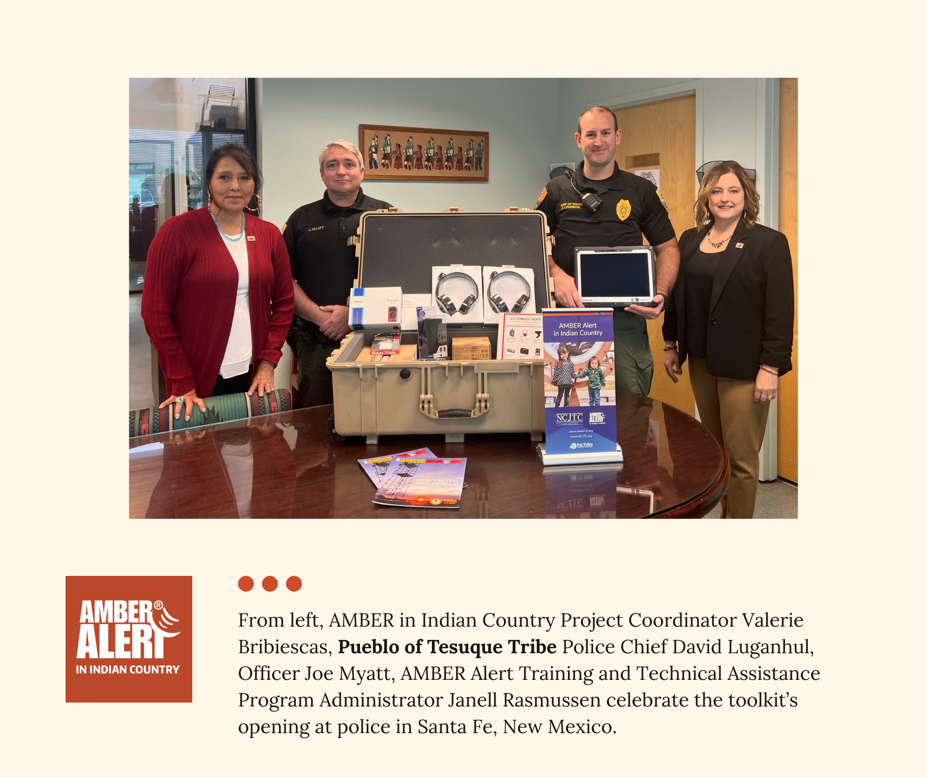From left, AMBER in Indian Country Project Coordinator Valerie Bribiescas, Pueblo of Tesuque Tribe Police Chief David Luganhul, Officer Joe Myatt, AMBER Alert Training and Technical Assistance Program Administrator Janell Rasmussen celebrate the toolkit’s opening at police in Santa Fe, New Mexico.