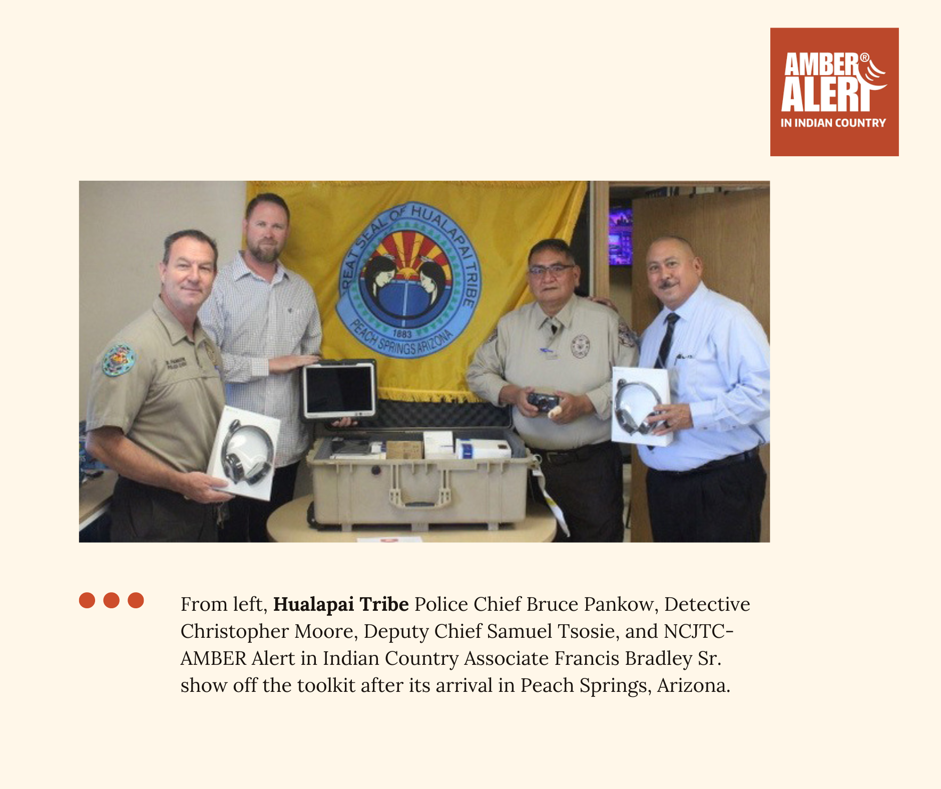 From left, Hualapai Tribe Police Chief Bruce Pankow, Detective Christopher Moore, Deputy Chief Samuel Tsosie, and NCJTC-AMBER Alert in Indian Country Associate Francis Bradley Sr. show off the toolkit after its arrival in Peach Springs, Arizona.