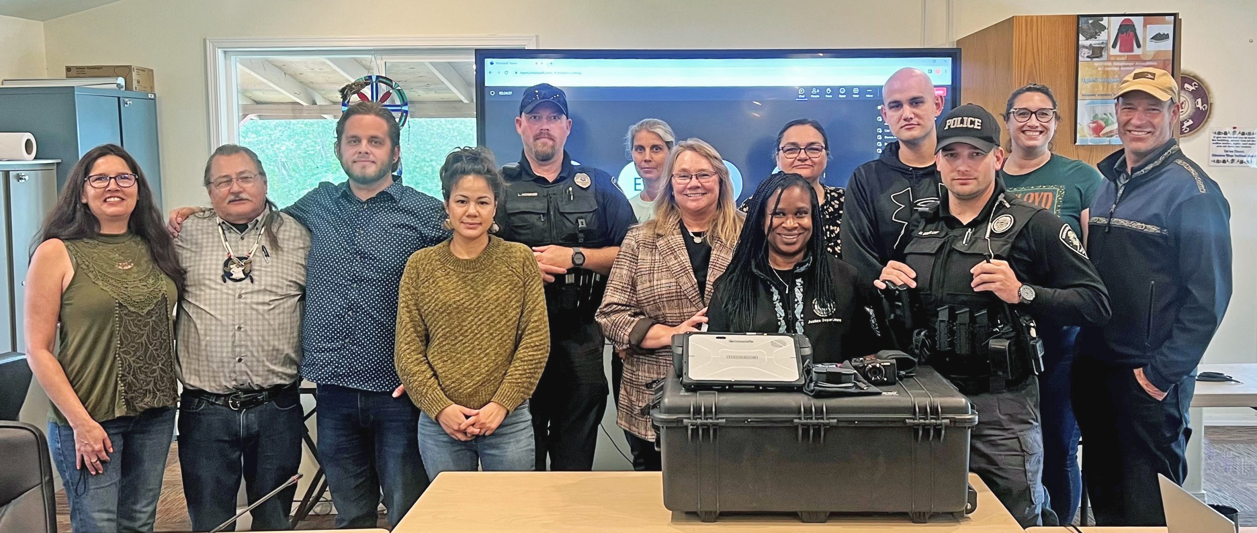 The Chickaloon Tribal Police team in Palmer, Alaska, accepts a Technology Toolkit provided by the AMBER Alert in Indian Country initiative.