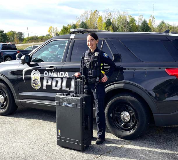 In Wisconsin,Oneida Nation Police Lieutenant Justine Wheelock (below) shows off her agency’s toolkit before the meeting’s group photo.
